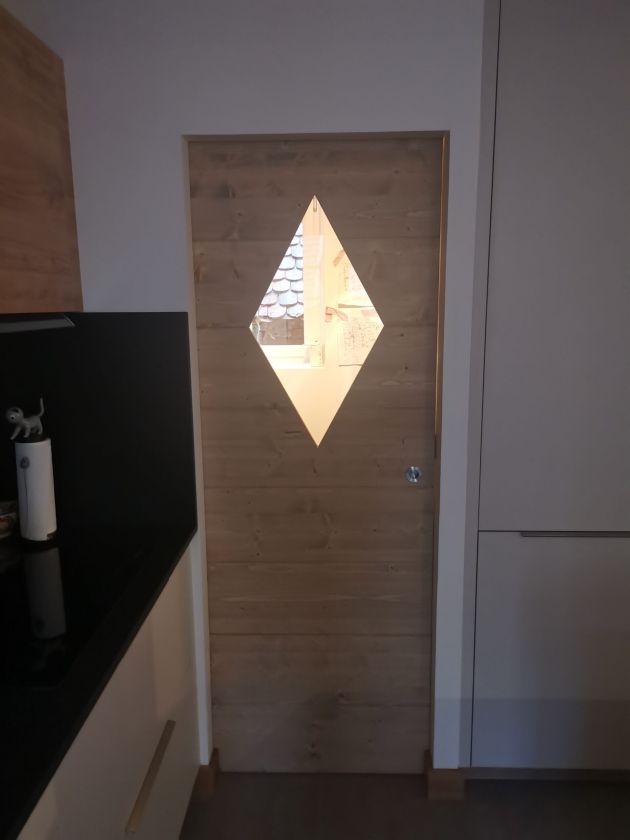 Porte-coulissante-bois-massif-menuiserie-boeckel